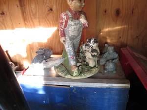 lot 249 image: Painted wood garden cabinet with rabbit and fishing boy with dog themed yard decor