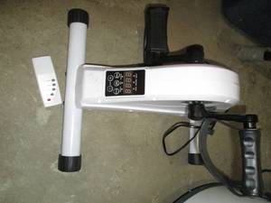 lot 159 image: LubbyGim under the desk style exerciser with remote