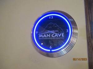 lot 107 image: Round neon Man Cave clock