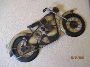 lot 109 image: Laser cut metal motorcycle wall decor