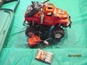 lot 130 image: Remote control Roughneck Lifted RC truck with battery and wall adapter