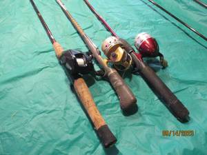lot 133 image: Trio of Storm and Daiwa branded fishing rods and reels