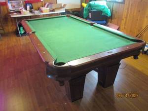 lot 15 image: Full size MD SPORTS pool table with leather style pockets. buyer MUST bring their own assistance to remove table from lower level of the home