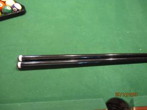 Pair of Minnesota Fats pool cues