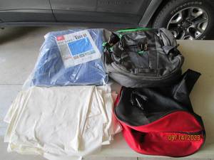 lot 77 image: Multi-compartment Backpack with new tarp other coverings