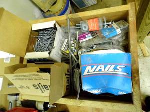 lot 38 image: Wood box loaded with a huge Assortment of larger gauge nails, bolts and other hardware