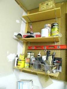 lot 40 image: Corner lot of paint, stains, supplies and accessories