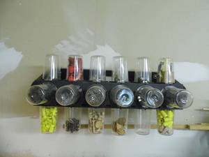 lot 69 image: Wall mounted and spinning parts organizer complete with hardware