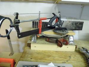 lot 253 image: Bench top miter saw and box with extras