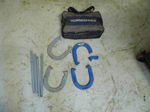 lot 266 image: Metal horseshoe set with carrying bag (1-shoe is broken and potentially fixable)
