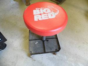lot 300 image: Torino Big Red smooth rolling padded shop chair with compartmentalized organizer base