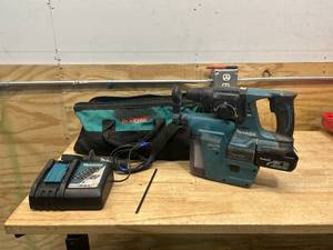 lot 85 image: MAKITA Hammer Drill with HEPA Filter, Battery, Charger and Bag