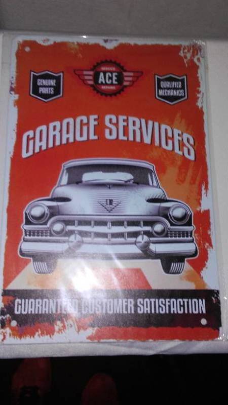 lot 673 image: Garage Services Metal Sign.