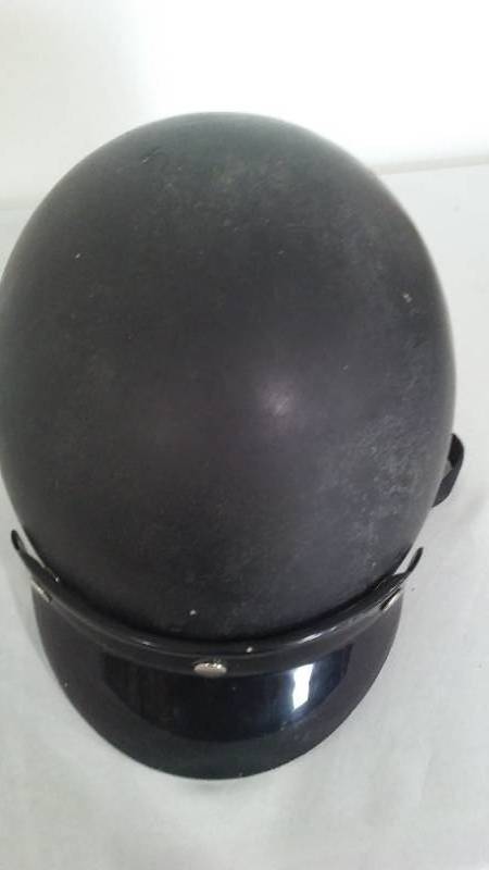 lot 838 image: Vintage. Harley Davidson Helmet.