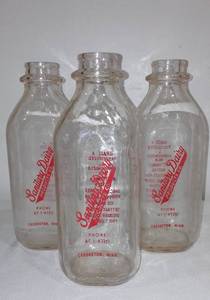 lot 522 image: Sanitary Dairy Glass Milk Jugs (3)