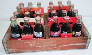 lot 556 image: Coca-Cola Crate W Full Bottles.