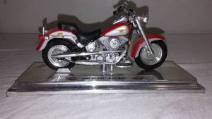 lot 561 image: Harley-Davidson 1999 FLSTF Fat Boy Model Motorcycle.