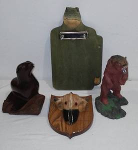 lot 681 image: Black Wood Seal And More.