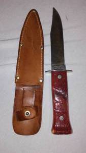 lot 748 image: Imperial Knife with Leather Sheath.