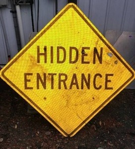 lot 716 image: Hidden Entrance Sign, Metal.