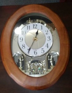 lot 786 image: Small World Rhythm Clock.
