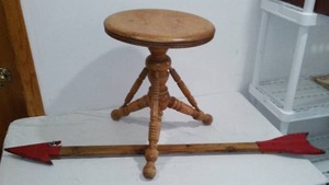 lot 803 image: Stool and wood Arrow.