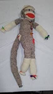 lot 823 image: Vintage Sock Monkey.