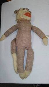 lot 825 image: Vintage Sock Monkey.