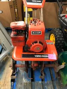 lot 7 image: YARD MAN TILLER