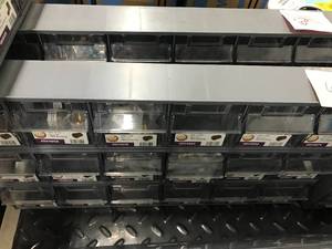 lot 61 image: 18 BINS WITH ASSORTED BRASS ITEMS