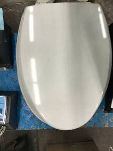 lot 138 image: TOILET SEAT AND COVERS