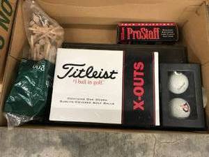 lot 148 image: GOLF BALLS AND TEES