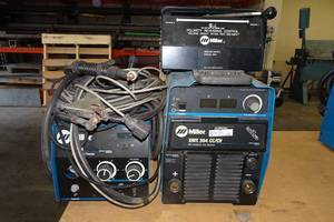 lot 244 image: Miller XMT 304 CCCV DC Inverter Arc Welder with 22A 24V Wire Feeder and Polarity Reversing Control