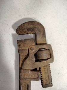 lot 271 image: Monkey Pipe Wrench and Manual Hand Drill Auger