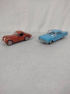 lot 289 image: Pair of Vintage Die Cast Cars, 1959 Chevy and 1949 Jaguar