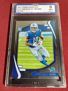 lot 36 image: 2021 Absolute Amon-Ra St. Brown Rookie Card - ISA 9