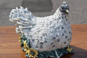 lot 212 image: Hen Sitting on Flowers Sculpture