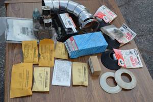 lot 57 image: Carry Over Orifice Kits, varying sizes ($200.00 Value), Roof Venting Rain Collars, Honeywell Module (for furnace, boiler, or other applications) s8610u Continuous Retry (retail $140), White-Rodgers Gas Valve, Duct Work, etc.