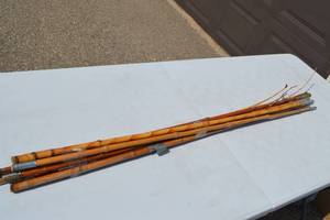 lot 11 image: Bundle of 3 Cane Fishing Poles