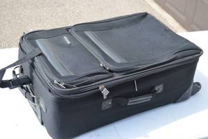 lot 26 image: Used Protege Luggage Bag