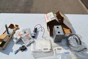 lot 53 image: Combination FanLimit Controls(retail $180.00ea), Hard Start Capacitor Kit (retail $30.00), Carrier Compressor Terminals Plug (retail $40.00), Q539a Round Thermostat Subbases (retail $15 each), Miscellanous Parts and Supplies Over $600.00 Value