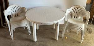 lot 20 image: Plastic Table With Eight Chairs (Needs A Good Cleaning)