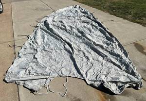 lot 48 image: Brand New 16 Boat Cover Never Used With Rubber Tie Downs