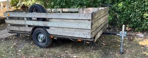 lot 8 image: 2001 Homemade Utility Trailer With Wood Sides 10 L (12 With Tongue) X 74 12 W. Has Hinged Ice Holes In Floor (Was Used For Ice Fishing) (Lifetime Reg.)