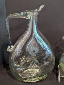 lot 102 image: Three Decorative Blown Glass Pitchers