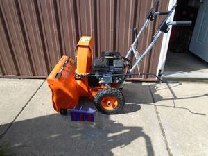 Yardmax 5 hp 22 snow blower. Looks used once or twice. Still has paint on auger. Tested & works. As shown.