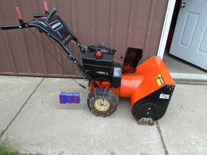 Americana snow blower. Used condition. Tested & works. As shown.