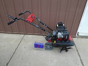 Eartquake 20 roto tiller. Looks new. As shown.