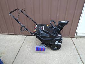 21 electric start snow thrower. Looks nearly new. As shown.