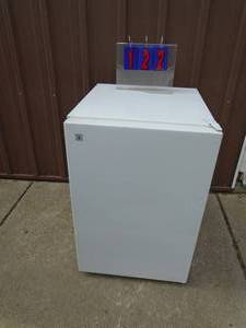 Upright freezer 33 x 21 x 26 cooling coils in shelves. Was running at -20. As shown.